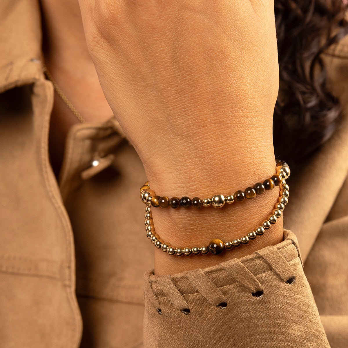 Elastische kralenarmband met Tiger Eye - My Bendel - My Bendel Elastische kralenarmband met Tiger Eye - My Bendel - My Bendel