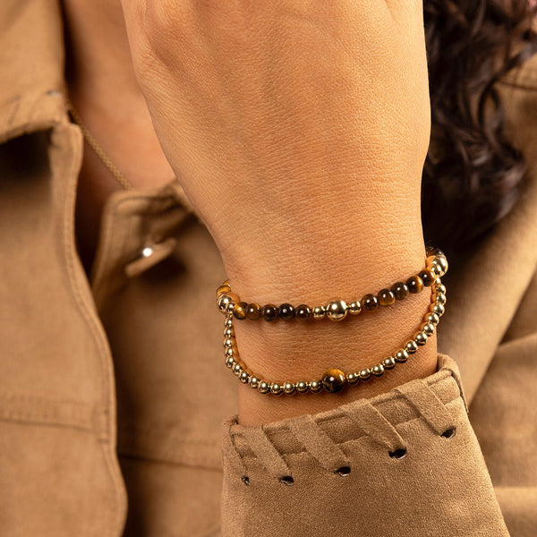 Elastische kralenarmband met Tiger Eye - My Bendel - My Bendel Elastische kralenarmband met Tiger Eye - My Bendel - My Bendel