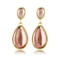 Elegante Gouden Oorbellen met Roze Druppelsteen Elegante Gouden Oorbellen met Roze Druppelsteen