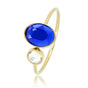 Gouden aanschuifring - blauwe en glassteen - Stainless steel Gouden aanschuifring - blauwe en glassteen - Stainless steel