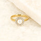 Gouden ring - witte parel - zirkonia steentjes Gouden ring - witte parel - zirkonia steentjes