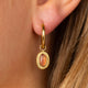 Oorbellen met Ovale Edelsteen en Ribbelrand • Berry Quartz