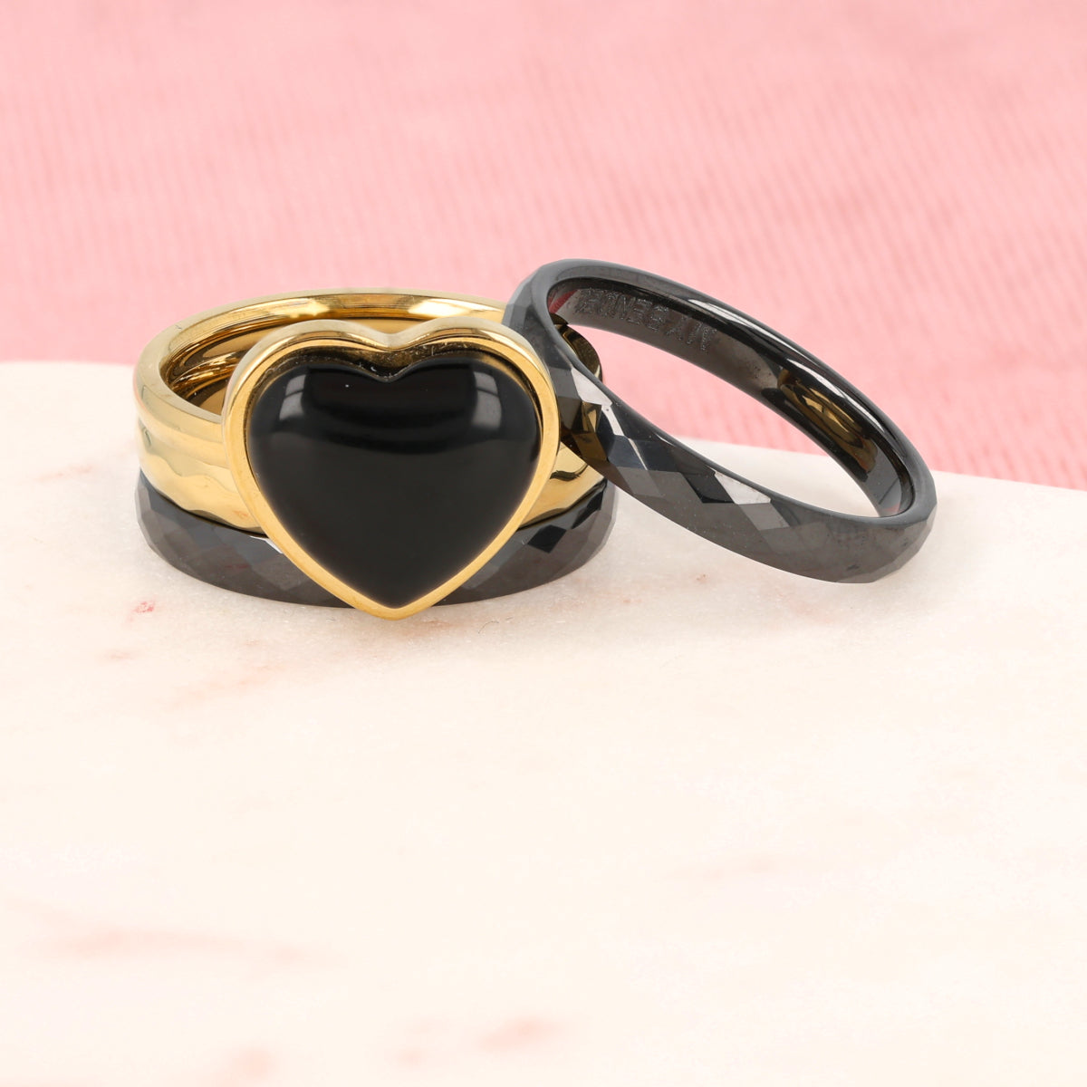 Gold ring set with Onyx heart for wisdom and logic