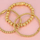 Gouden kralenarmbanden set