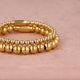 Gouden kralen armbandenset