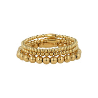 Gouden kralenarmbanden set