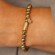 Elastisches Perlenarmband • 6 mm • Gold