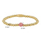 Armband aus goldenen Perlen mit Beerquarz