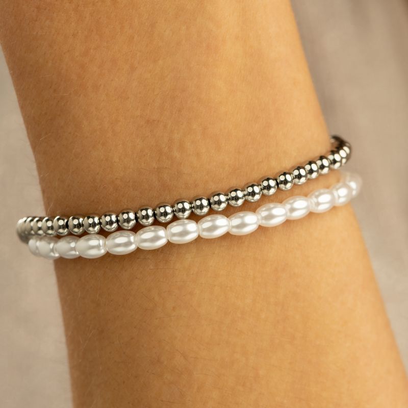 Zilveren armband met witte parels - elastisch