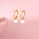 Elegant Gold Earrings with White Pearl Charm