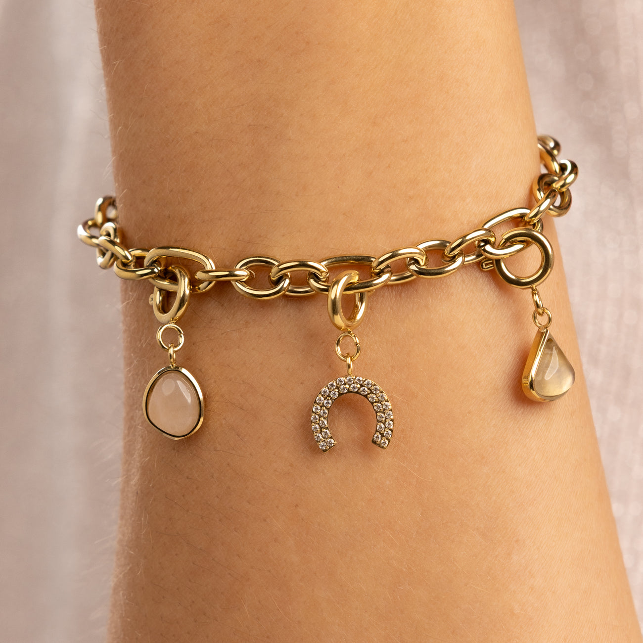 Schakelarmband met diverse bedels
