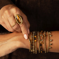 Elastische kralenarmband met Tiger Eye - My Bendel - My Bendel