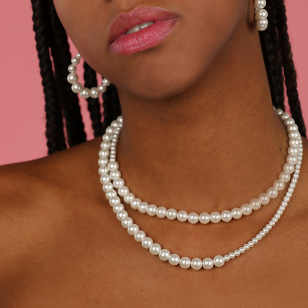 Dubbele ketting met grote en kleine witte parels