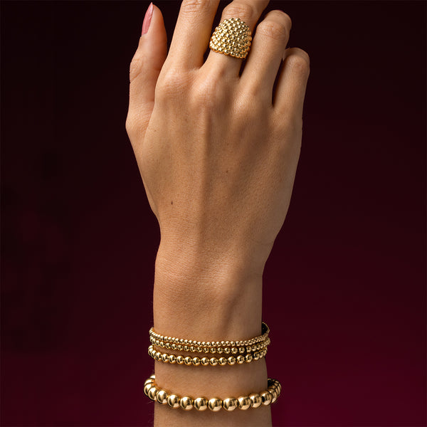 Gouden armband met 5mm stainless steel kralen