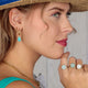 Golden Oval Earrings with Blue Howlite Pendant