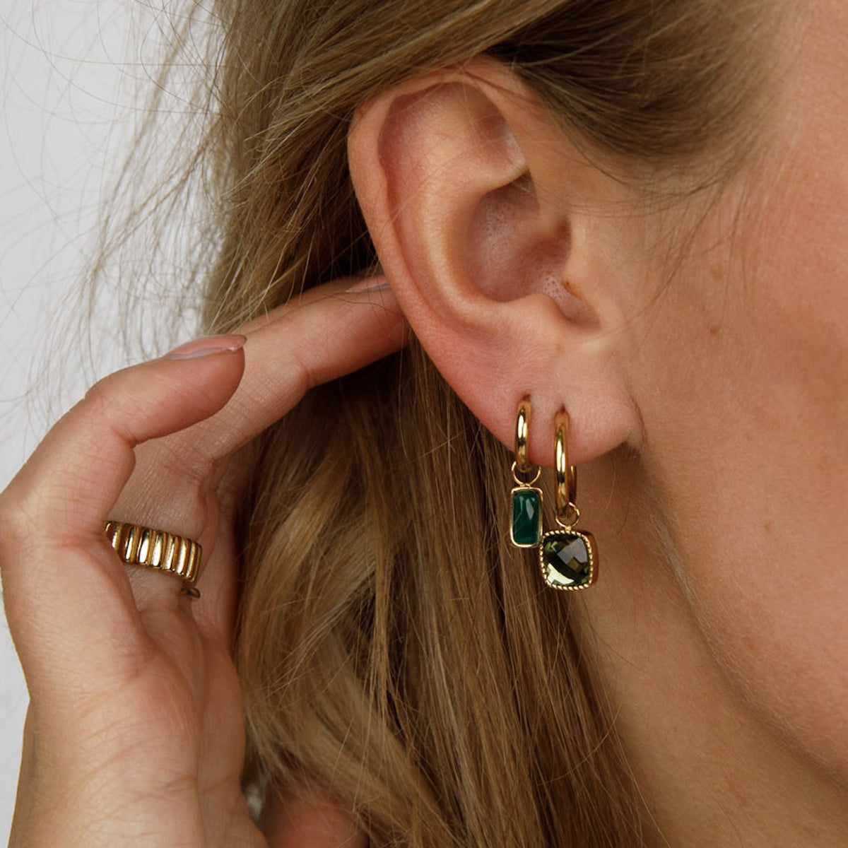 Elegant Gold Earrings with Green Glass Stone