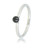 Silver stacking ring with ceramic bead.