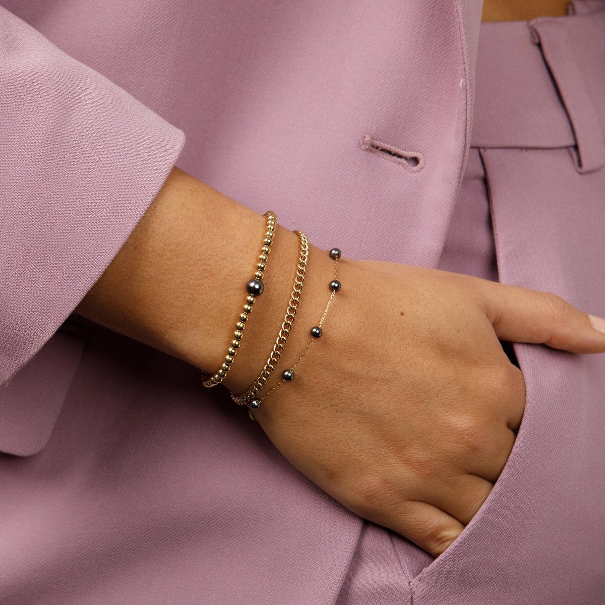 Gouden bedelsarmband met Zwarte Parel - Mysterieus - My Bendel