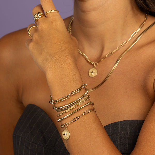 Gouden dames schakelarmband met bolletjes - My Bendel