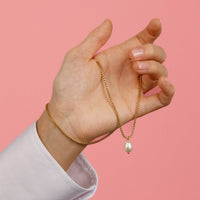 Gouden schakelketting met zoetwaterparel - My Bendel