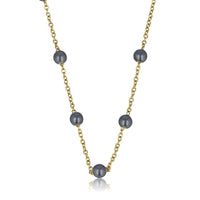 Goldene Gliederkette mit schwarzen Perlen - Feines Design