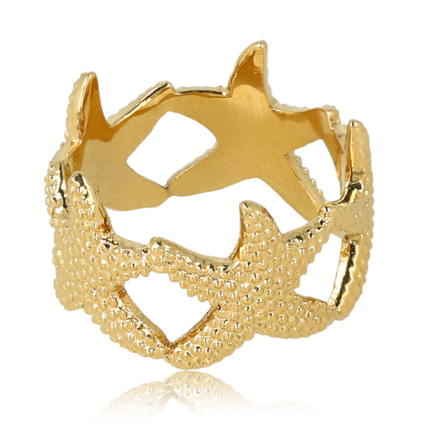 Brede gouden ring - Speelse zeesterren - Zomerse charme