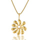 Elegant gold flower set with necklace and earrings. Large flower pendant and radiant pearls. Perfect for any occasion. My Bendel.