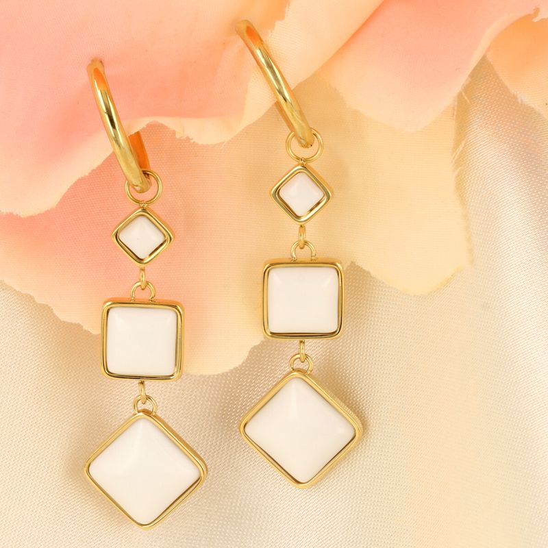 Elegante Gouden Oorbellen met White Aventurine 58mm