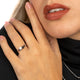 Silver stacking ring with ceramic bead.