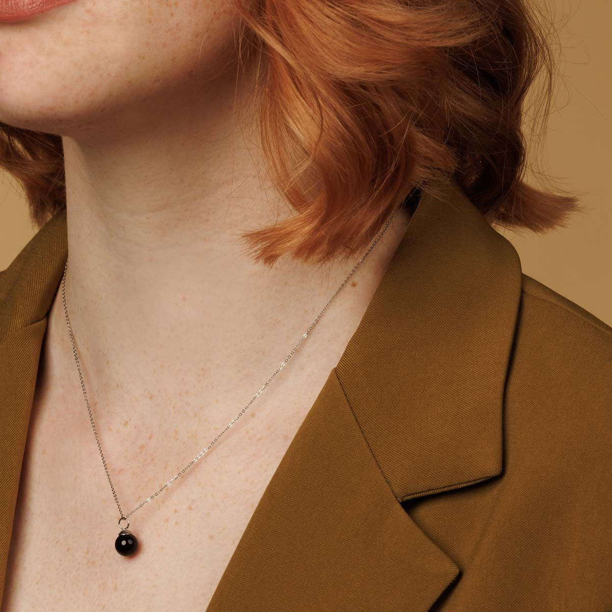 Zilveren ketting met ronde Onyx edelsteen