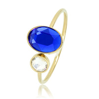 Gouden aanschuifring - blauwe en glassteen - Stainless steel
