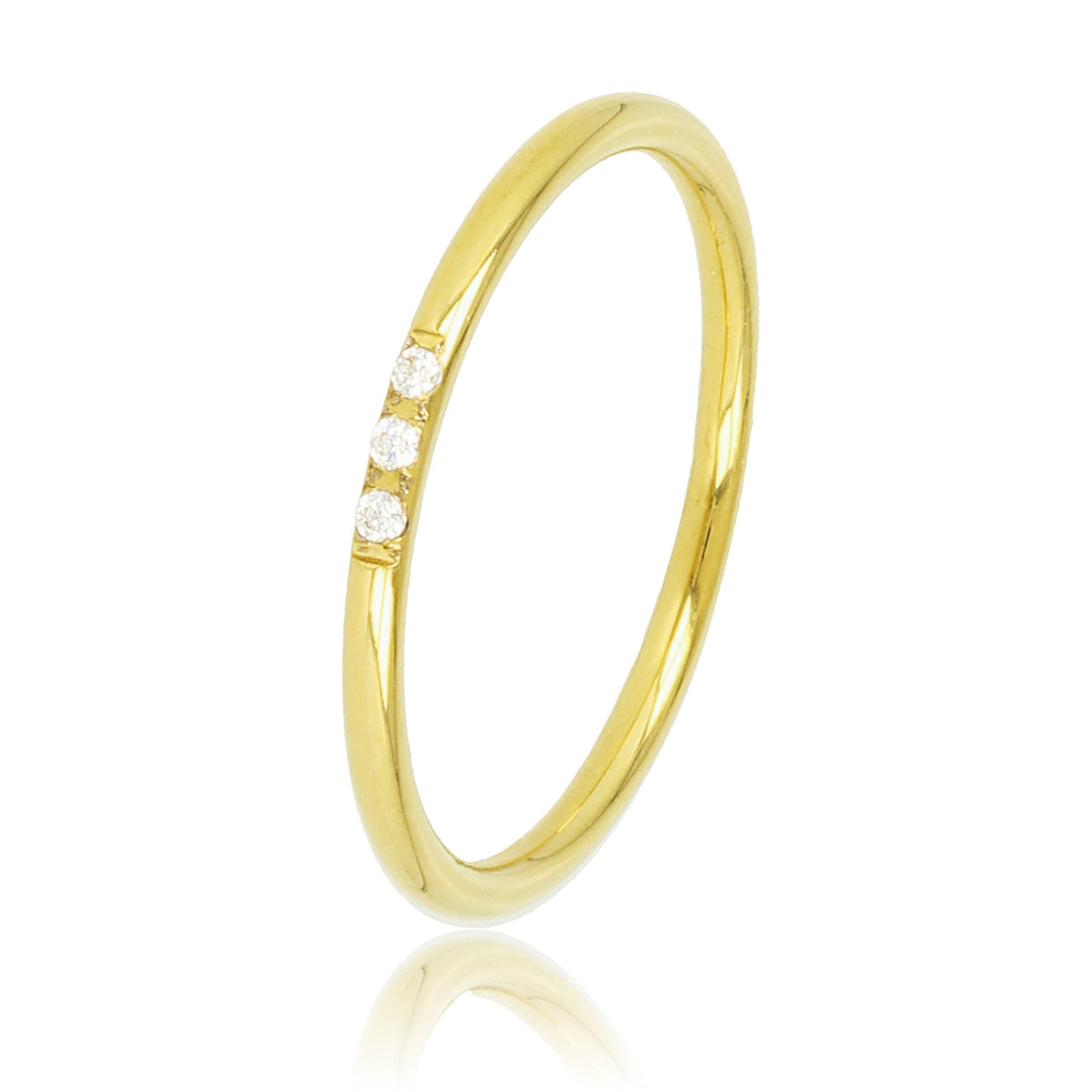 Minimalist gold ring - three white zirconia stones