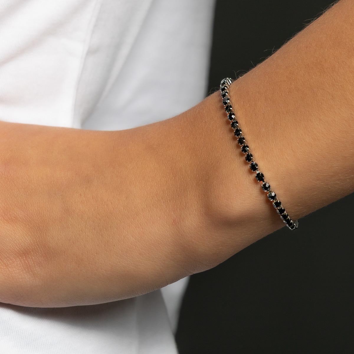 Silver tennis bracelet with black zirconia stones