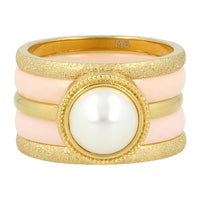 Elegante gouden ringenset met witte parel, stardust en roze keramiek. 5 ringen, los te dragen. 1 jaar garantie.