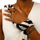 Gouden Armband met Zwarte Parels - Mysterieus Design