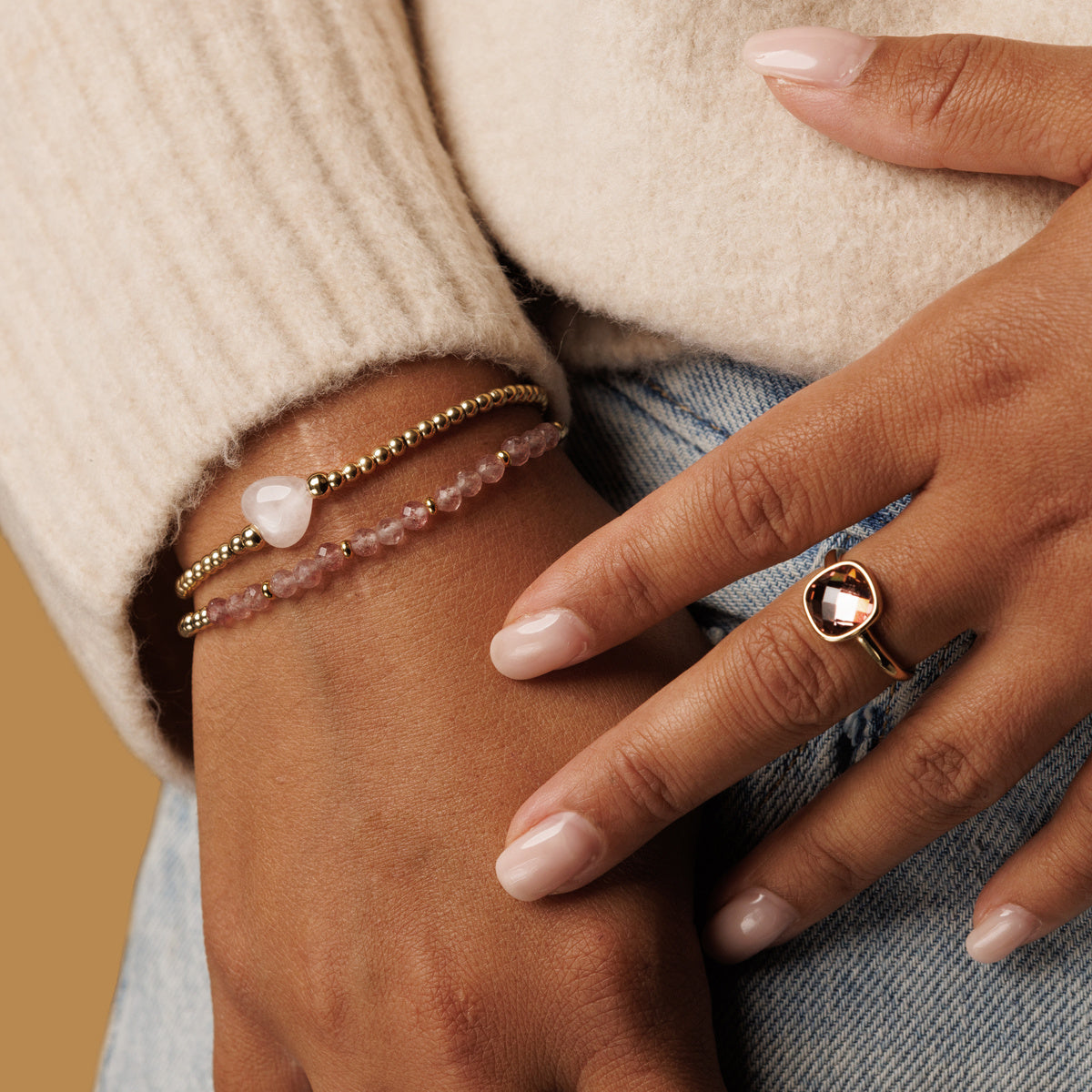 Elastische stainless steel Armband met Rose Quartz Bedel