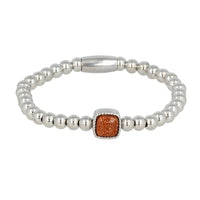 Elastische Damesarmband met Gold Sand Stone Bedel