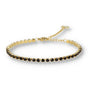 Gouden tennisarmband met zwarte zirkonia stenen