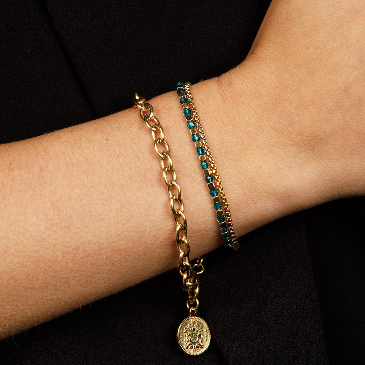 Golden Bracelet with Sapphire Glass Stones - Elegant Design