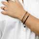 Gouden Armband met Zwarte Glasstenen - Elegant Accessoire