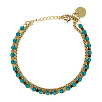 Golden Bracelet with Sapphire Glass Stones - Elegant Design