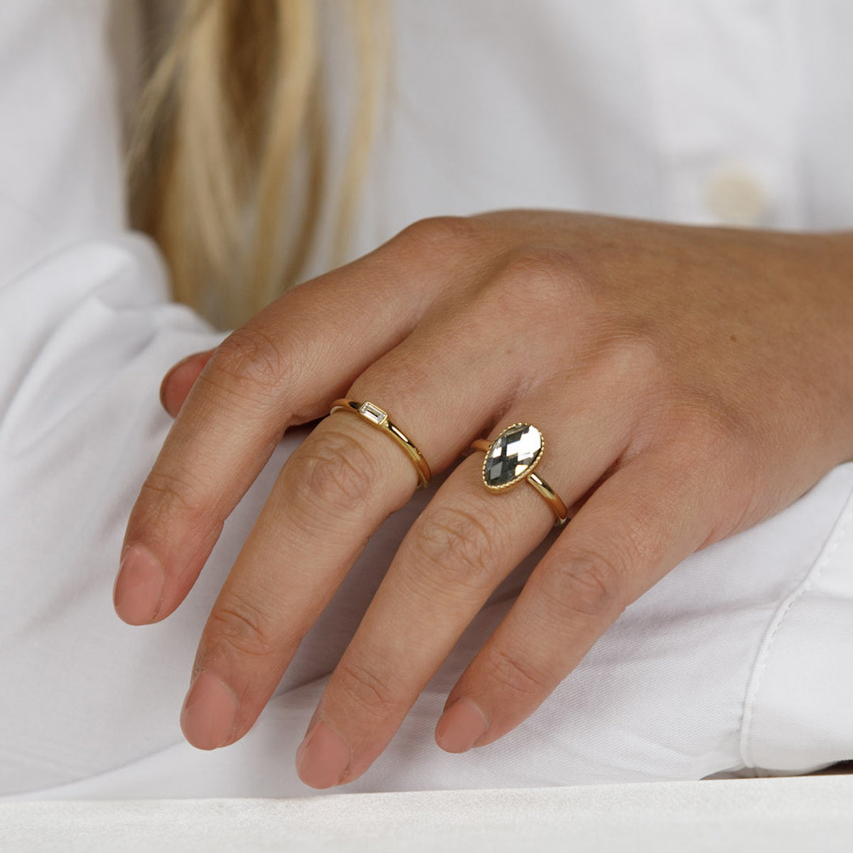 Golden twisted ring - White crystal stone drop