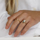 Golden twisted ring - White crystal stone drop
