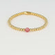 Armband aus goldenen Perlen mit Beerquarz
