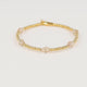 Armband mit facettierten ovalen Perlen • Champagner