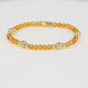 Elastic Beaded Bracelet with Amber and Golden Beads - Gold-Colored & Orange