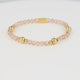 Elastic Beaded Bracelet with Smokey Topaz and Gold Beads - Gold-Colored & Beige