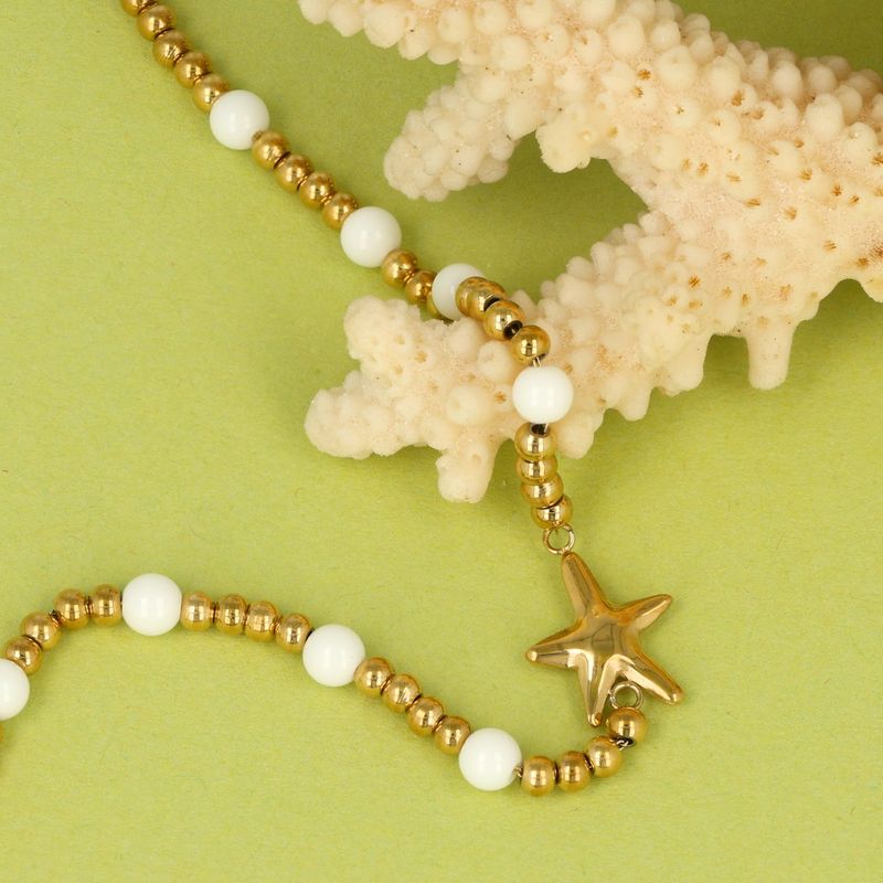 Goldenes Armband mit Seestern und Aventurin Edelsteinen