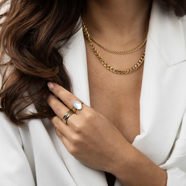 Bendel ringenset - goud met witte design steen