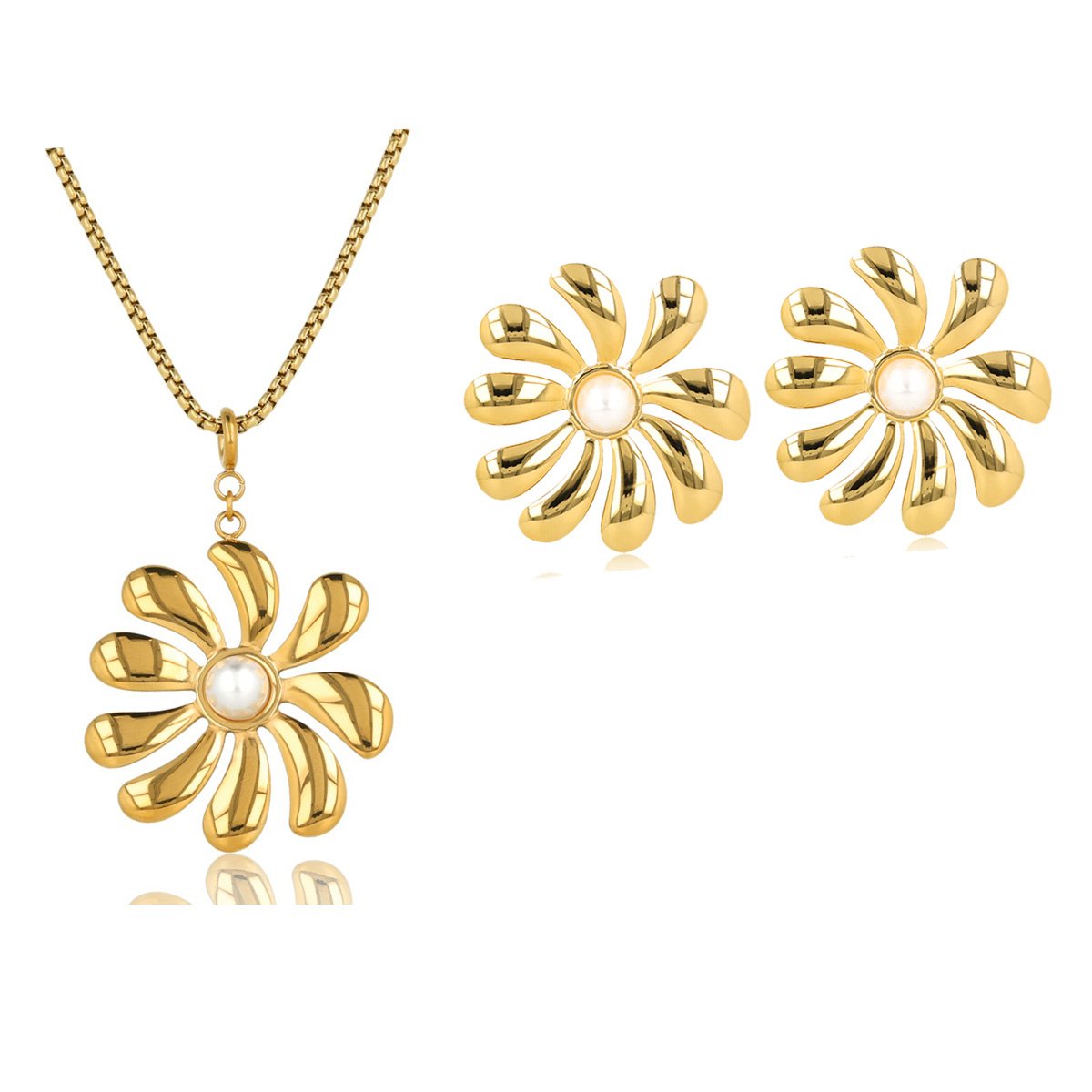 Elegant gold flower set with necklace and earrings. Large flower pendant and radiant pearls. Perfect for any occasion. My Bendel.